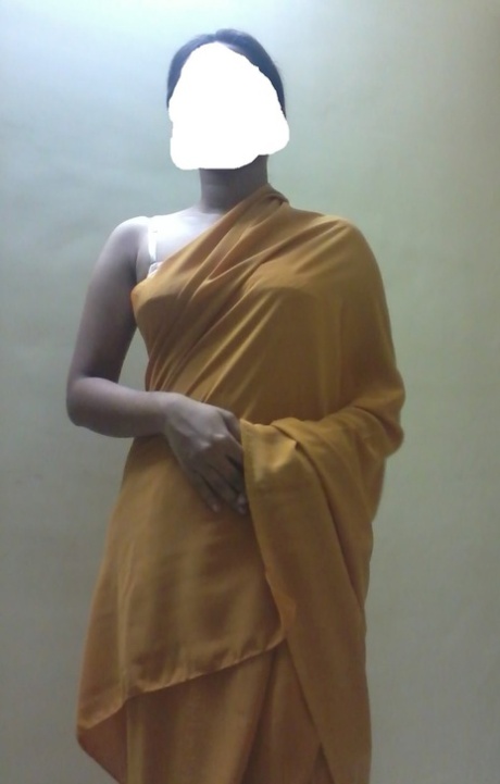 Indian solo girl poses in her brassiere with her face blurred out 36151118